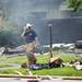 A firefighter walks away from the scene of an explosion at a house on Gattegno Street in Ypsilanti Township on Sunday, July 7. Daniel Brenner I AnnArbor.com